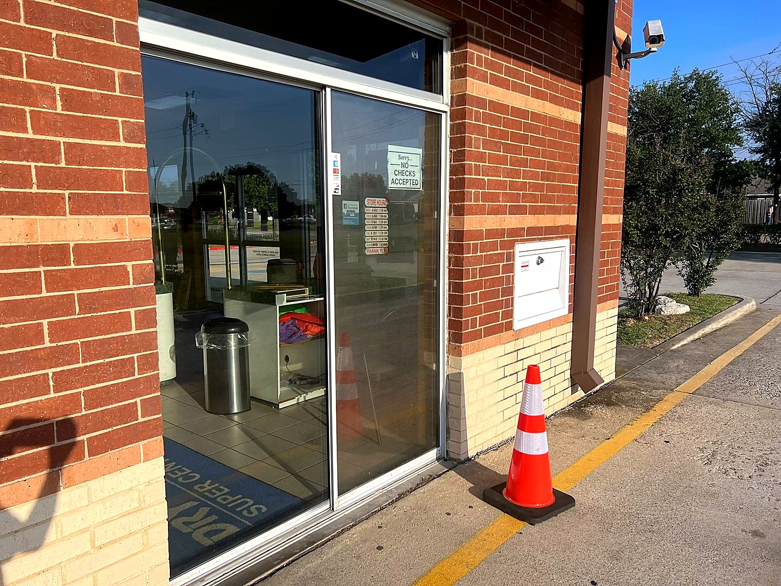 Drive-thru entrance and drop-off area at Dry Clean Super Center